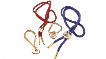 As part of AOPA’s Plantation Parties and Expos men were given bolo ties, women charm bracelets.